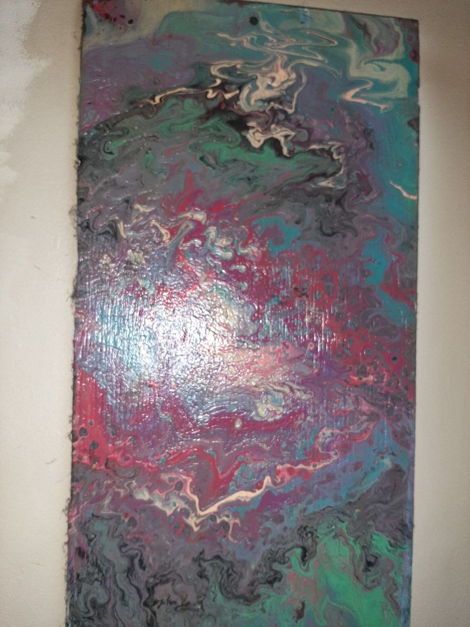 Fluid pour on wood — swirling teal, magenta and red with pearlescent streaks