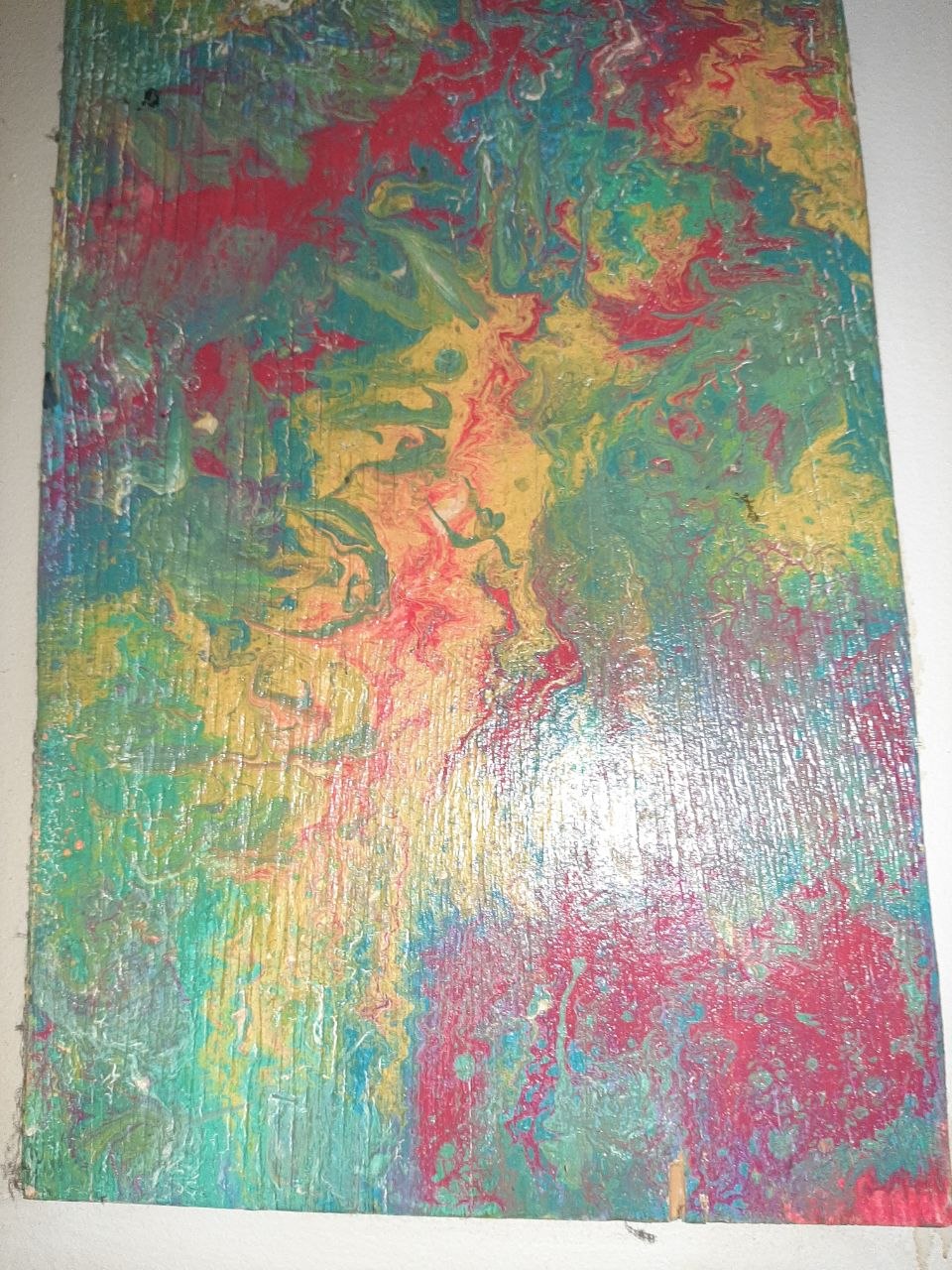 Fluid pour on wood — teal, crimson and golden yellow marble with vertical grain